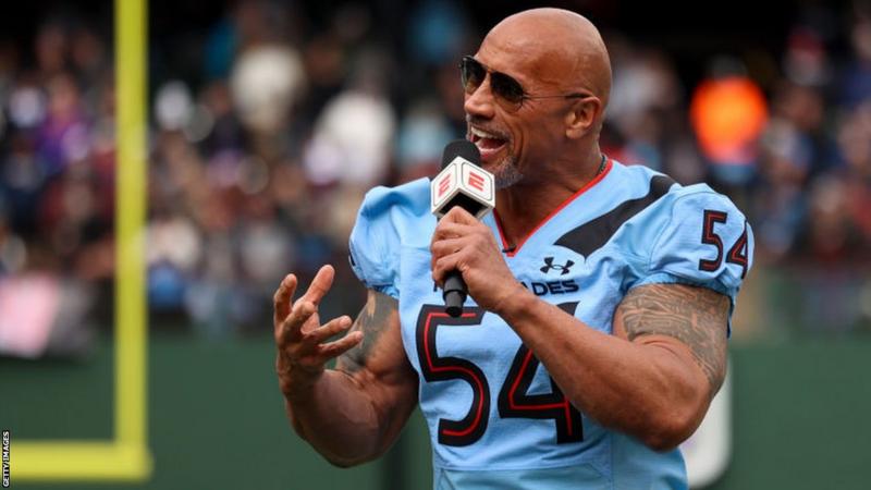 How The Rock Is Helping Others Live His NFL Dream<span class="wtr-time-wrap after-title"><span class="wtr-time-number">5</span> min read</span>