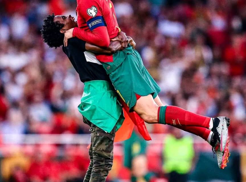 Cristiano Ronaldo Picked Up In Air By Portugal Pitch Invader In Strange Scenes vs Bosnia<span class="wtr-time-wrap after-title"><span class="wtr-time-number">1</span> min read</span>