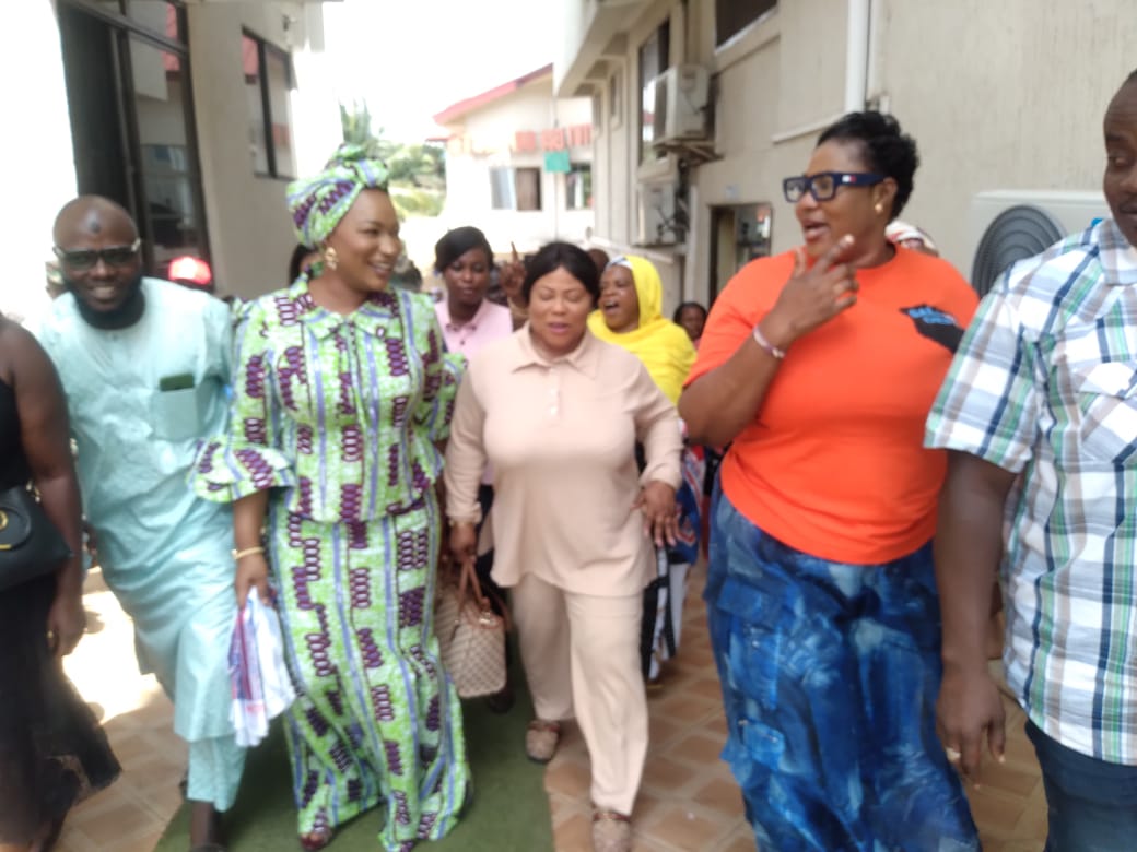 Samira Bawumia,  wife of the Vice President (second left) being escorted by the Ashanti Regional Women's Organiser,  Nana Ama Ampomah after the meeting on Monday.