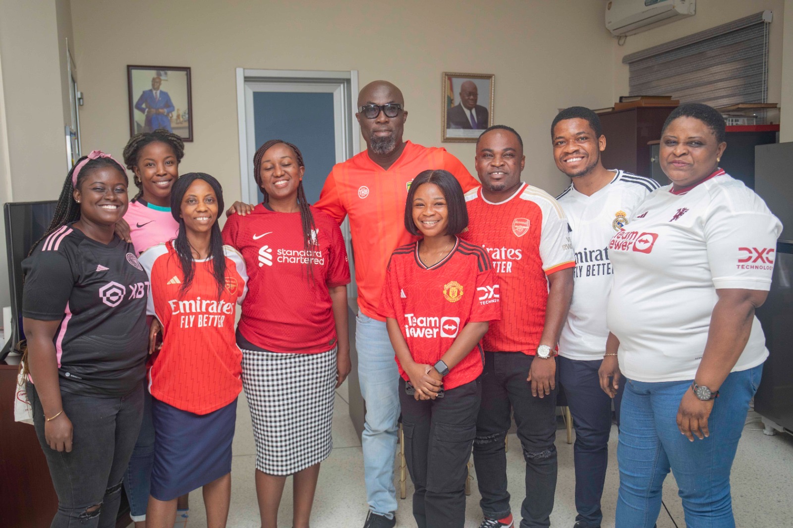 KATH CEO (4th right) in Kotoko replica jersey with some staff of the hospital in a group photograph